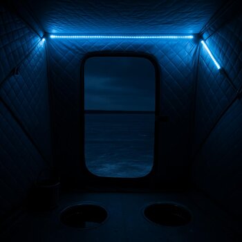 View from inside the shelter with a clean path to the door and sled